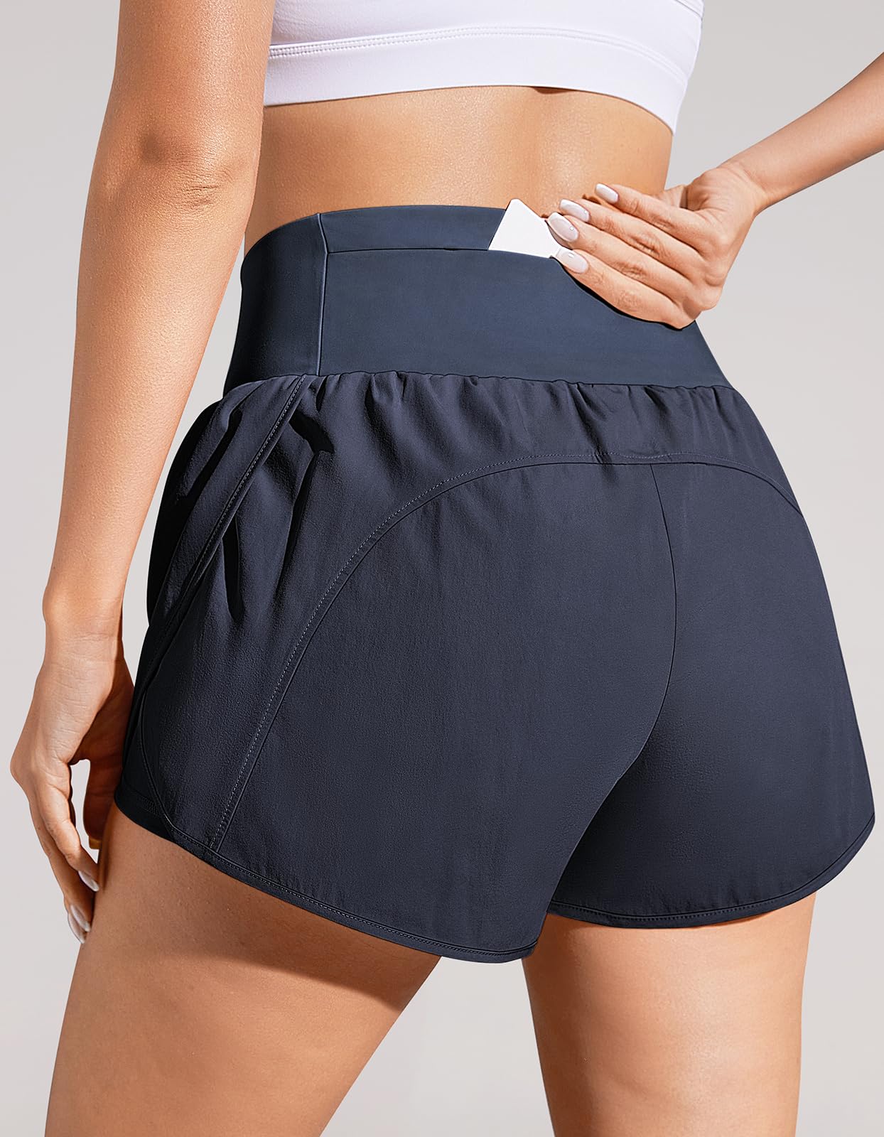 PRODUCTO 628 TARSE Pantalones cortos para correr para mujer, pantalones cortos de entrenamiento atléticos de secado rápido, pantalones cortos de gimnasio con forro ligero de cintura alta y bolsillos con cremallera, azul oscuro L